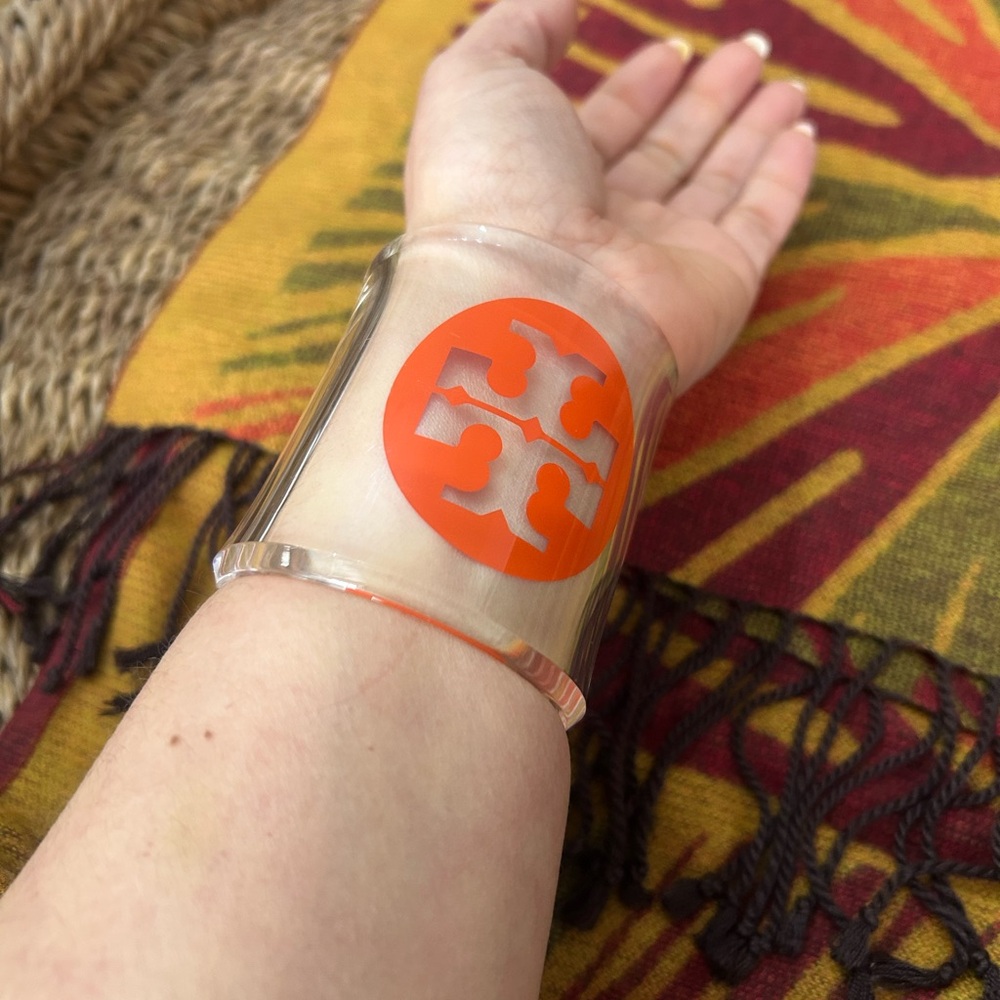 Tory Burch Transparent Cuff with Orange Emblem